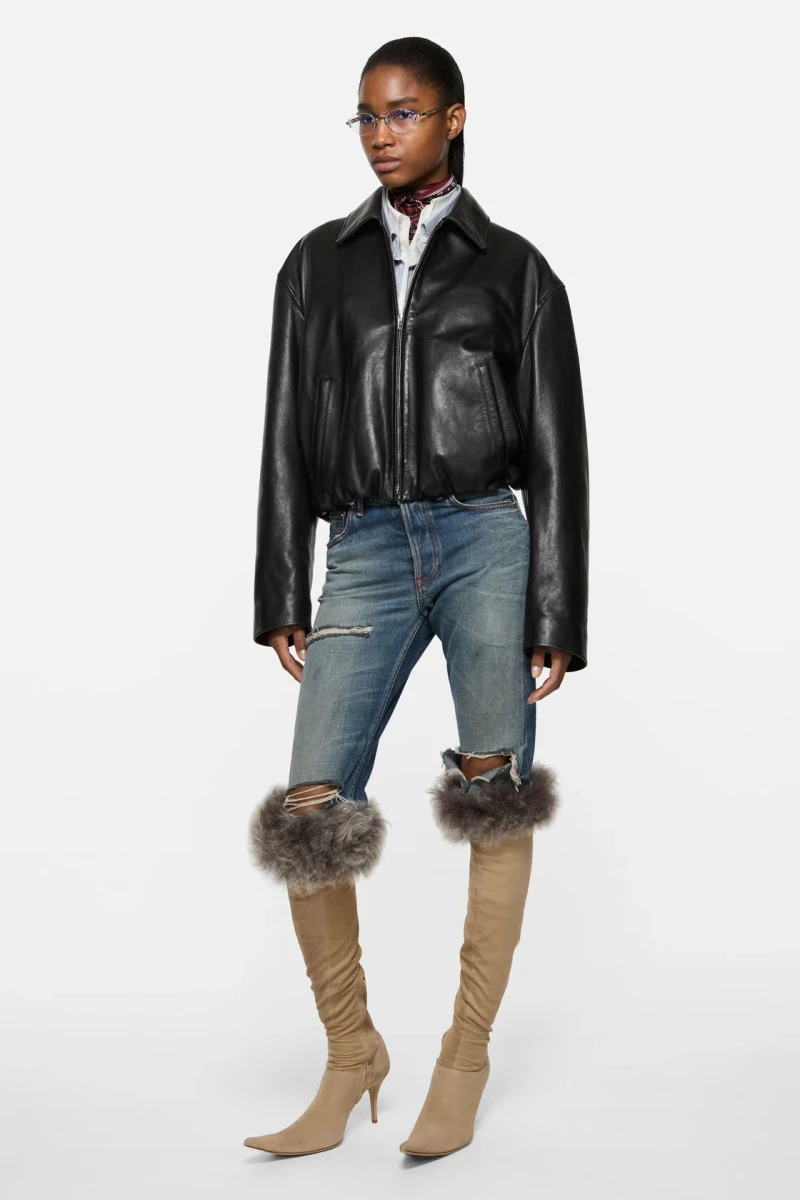Black Acne Studios leather bomber jacket in the official studio photograph
