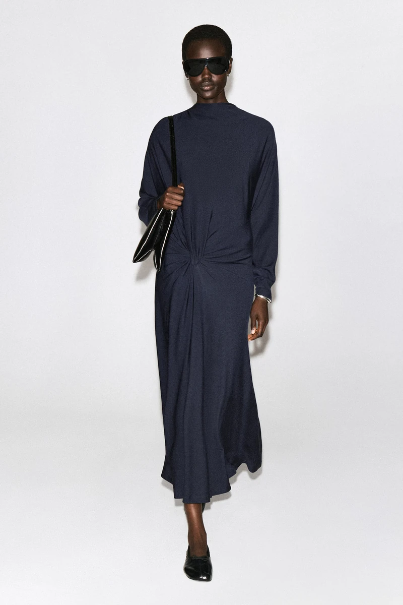 Navy COS draped twist-detail midi dress worn by a model