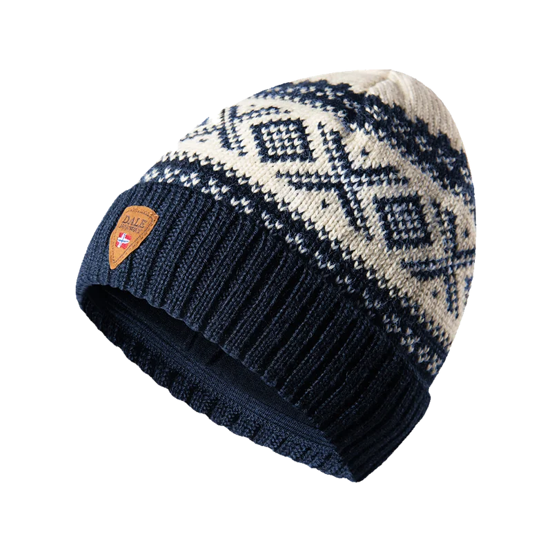 Dale of Norway Cortina 1956 navy and off-white patterned wool hat with ribbed edge and shield badge