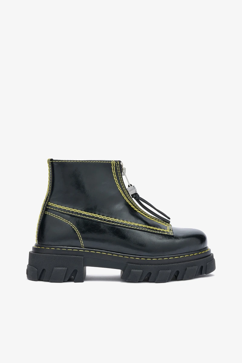 Black GANNI cleated boots in the official product photograph