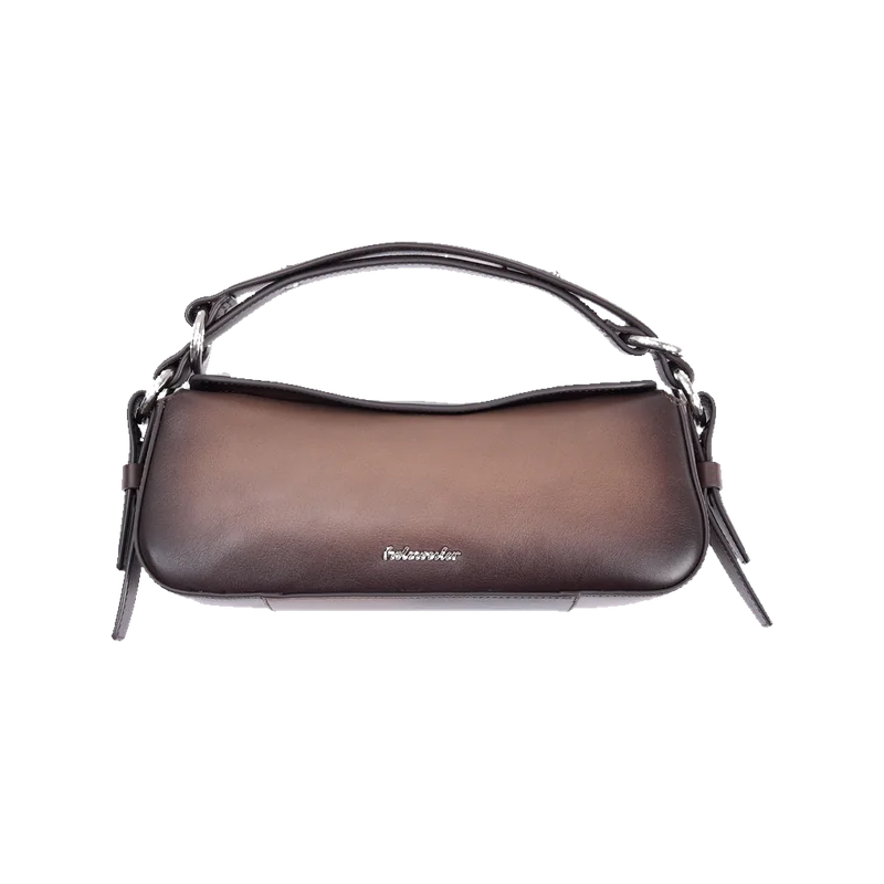 Holzweiler Bud Leather Slim Bag in dark brown with a curved shoulder handle, adjustable straps and metal hardware