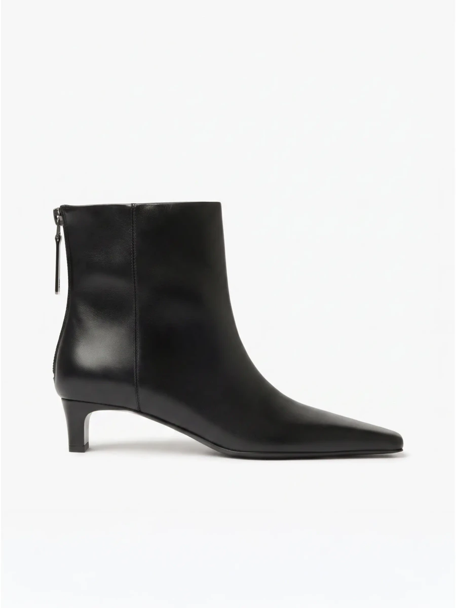 Black House of Dagmar leather boots in the official studio photograph