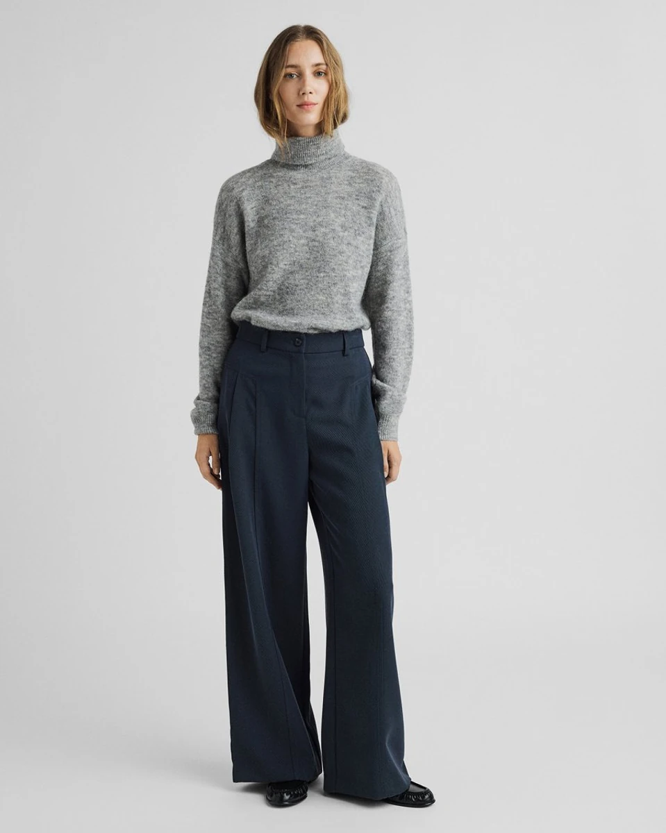 Dark MSCH Copenhagen Lauretta high-waist pants worn by a model
