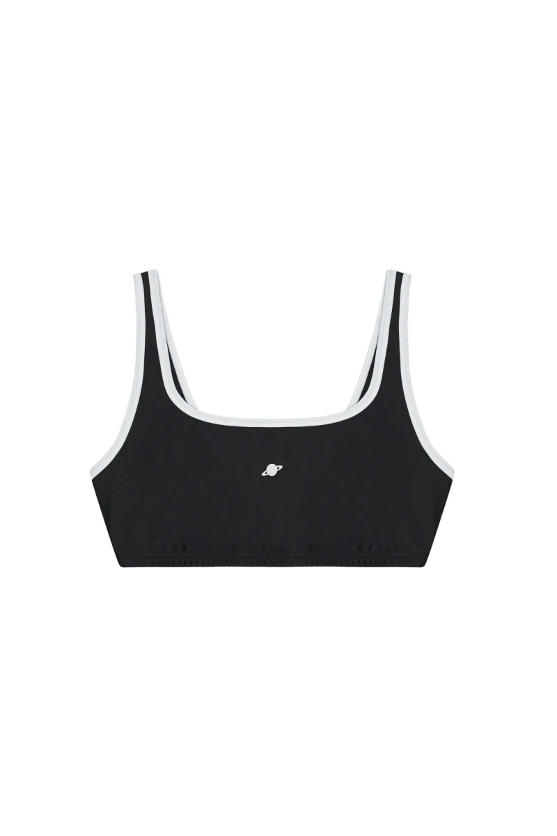 Black Planet Nusa Box1 sports bra with white trim on opaque white