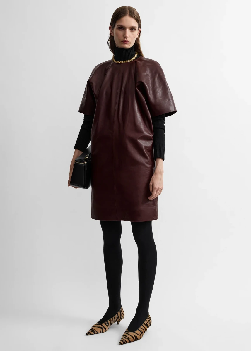 Bordeaux TOTEME cocoon leather dress shown on a model in the official product photograph