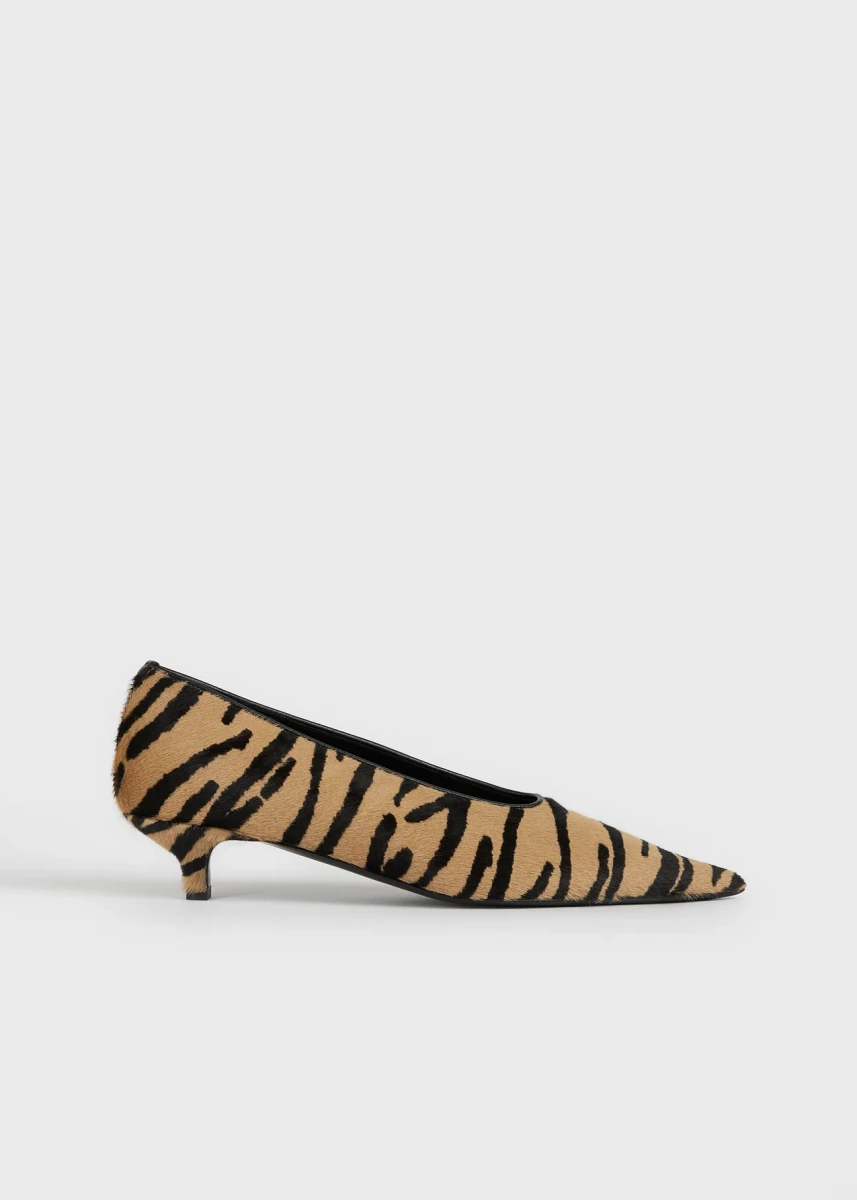 Tiger-pattern TOTEME kitten pumps in the official studio photograph