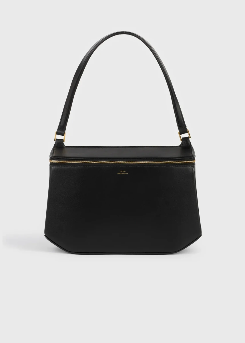 Black TOTEME Clip leather shoulder bag in the official studio photograph