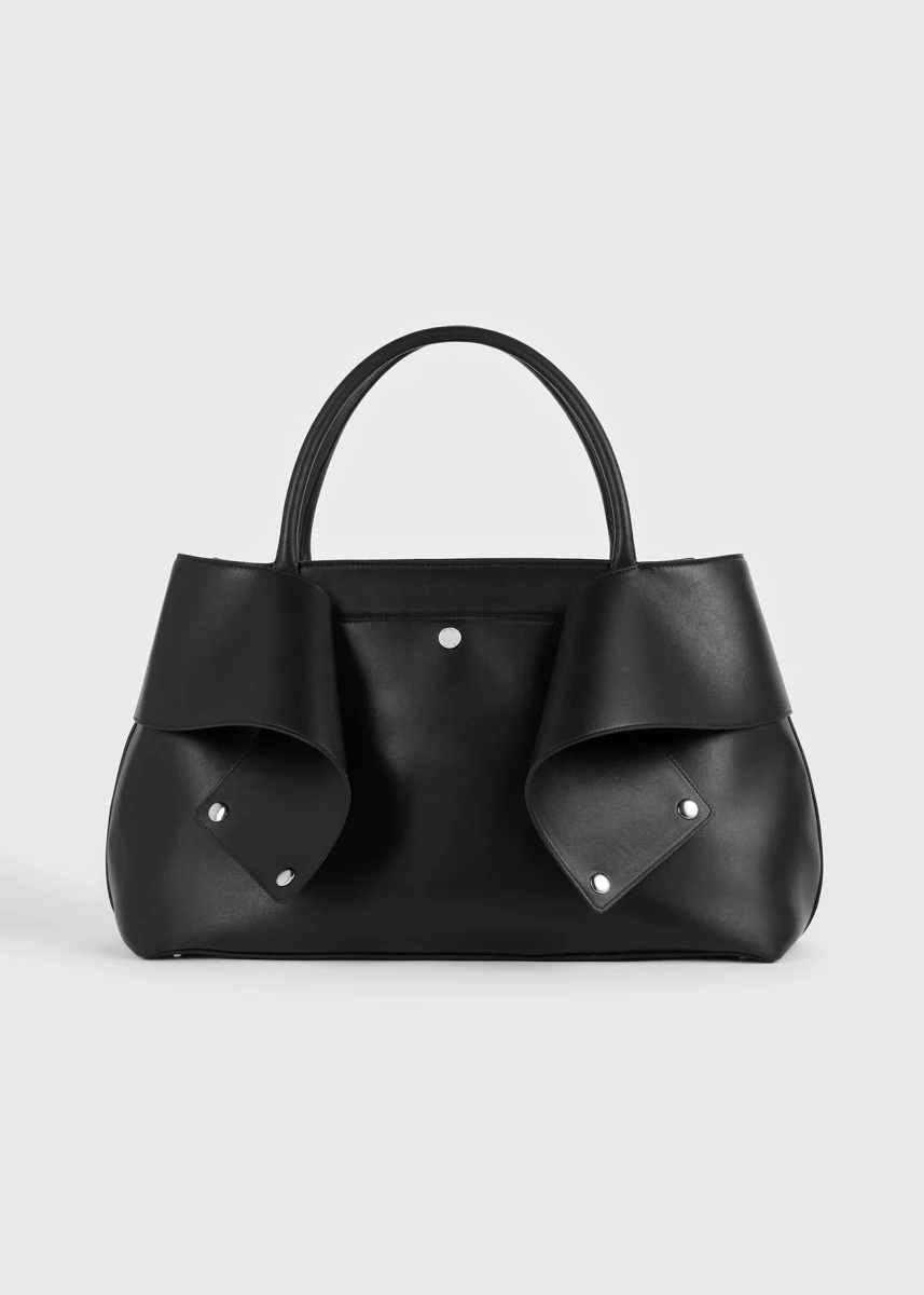 Black and red TOTEME Mercer leather tote in the official studio photograph